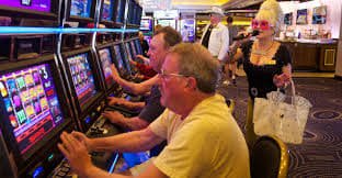Hawkplay VIP player enjoying mobile casino games on a smartphone in the Philippines